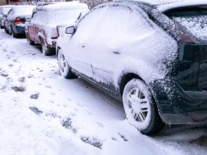 Cars parked in the snow during the winter